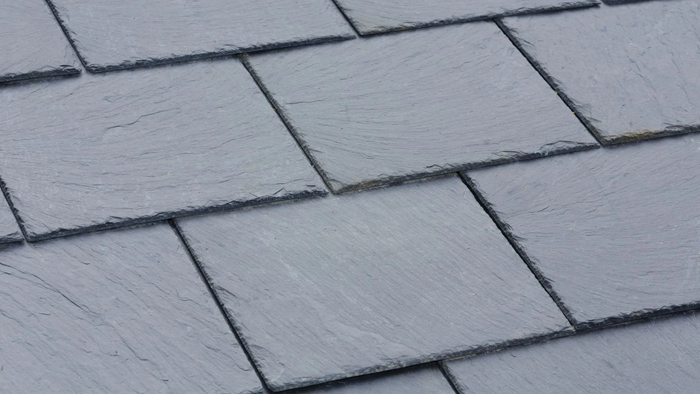 Newly installed natural slate roof in Zürich by Dachdecker Zürich